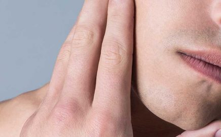A man's face with no shaving irritation
