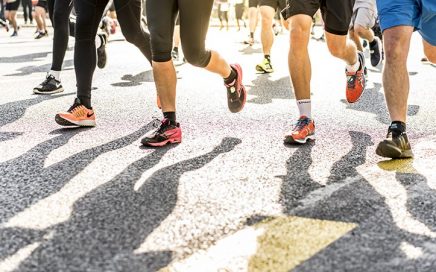 Do men shave their legs for sport? This photo of men running demonstrates