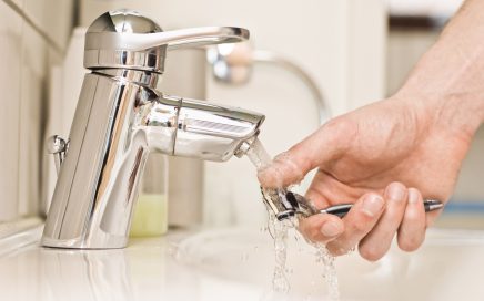 Person demonstrating how to clean a razor effectively